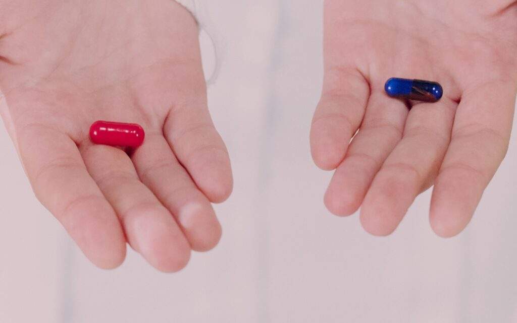 Photo by Ron Lach : https://www.pexels.com/photo/woman-holding-and-showing-pills-9761337/